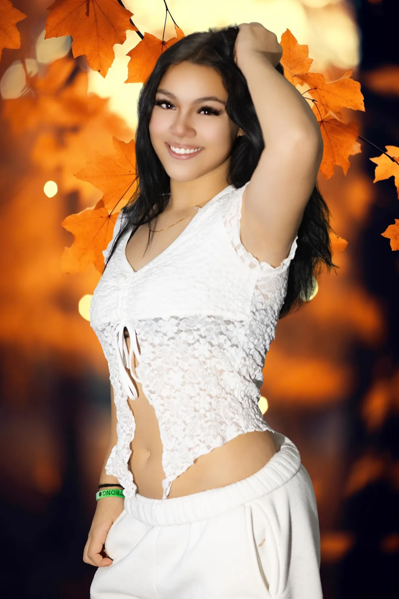 Senior portrait among autumn leaves