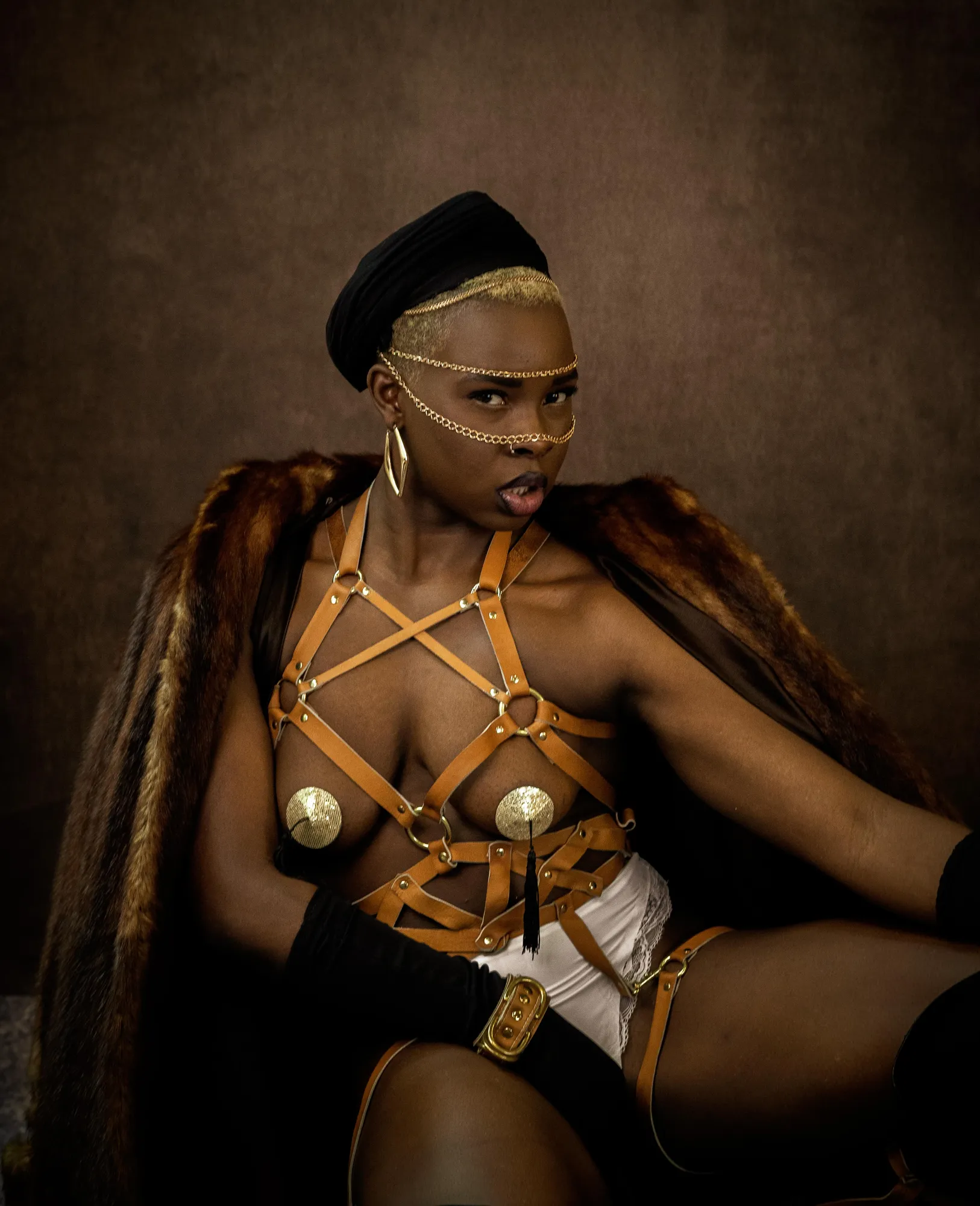 Avant garde portrait with fur and leather